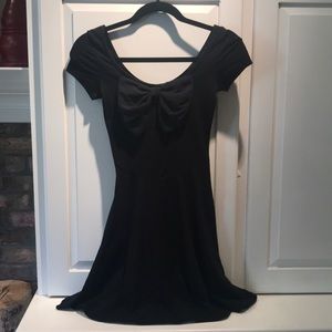 Black, bell-sleeved, bow dress
